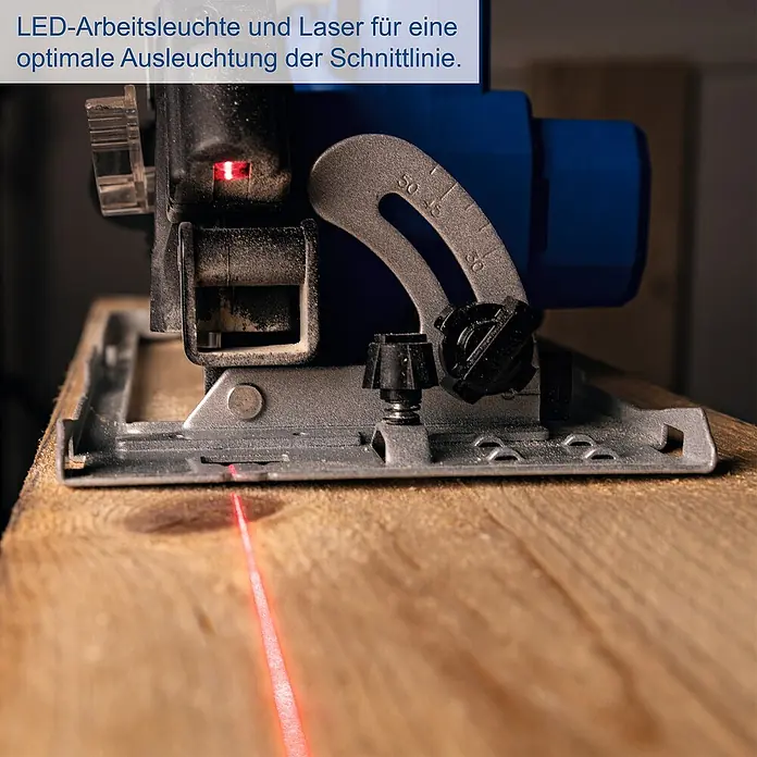 Scheppach IXES 20V Akku-Handkreissäge C-HCS165-X - 20 V, Durchmesser Sägeblatt: 165 mm - Nahaufnahme einer Kreissäge mit Laserführung, die auf einem Holzbrett steht.