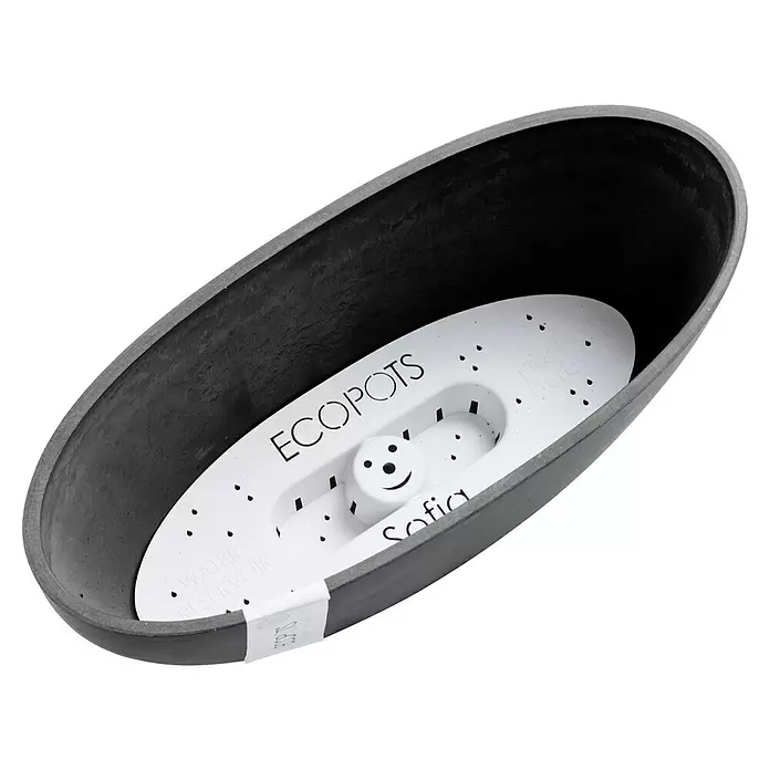 Ecopots Sofia Pflanzschale rund Oval - Dunkelgrau - Dunkelgrauer ovaler Pflanzentopf mit weißem ECOPOTS Sofia Selbstbewässerungseinsatz mit Smiley-Gesicht und Drainagelöchern.