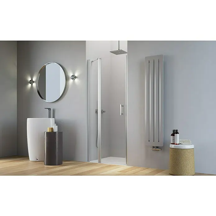 Camargue Level 5 Nischendusche - Länge: 100 cm, Unbeschichtet - Ein elegantes Badezimmer mit einer stilvollen Duschkabine, einem modernen Waschbecken und einem Heizkörper. Das Design ist minimalistisch und ansprechend.