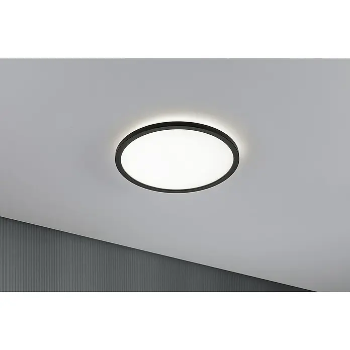 Paulmann LED-Panel Atria Shine - Durchmesser: 29,3 cm, 19 W, Schwarz, Neutralweiß - Nahaufnahme einer modernen, runden Deckenleuchte mit schwarzem Rahmen, die helles Licht in einem minimalistischen Raum spendet.