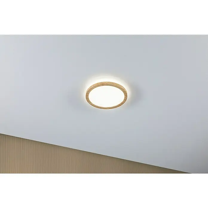 Paulmann LED-Panel rund Atria Shine IP44 - 12,5 W, Durchmesser: 19 cm, Holz, Neutralweiß - Nahaufnahme einer runden LED-Deckenleuchte mit Holzrahmen, die ein warmes, einladendes Licht in einem modernen Raum ausstrahlt.