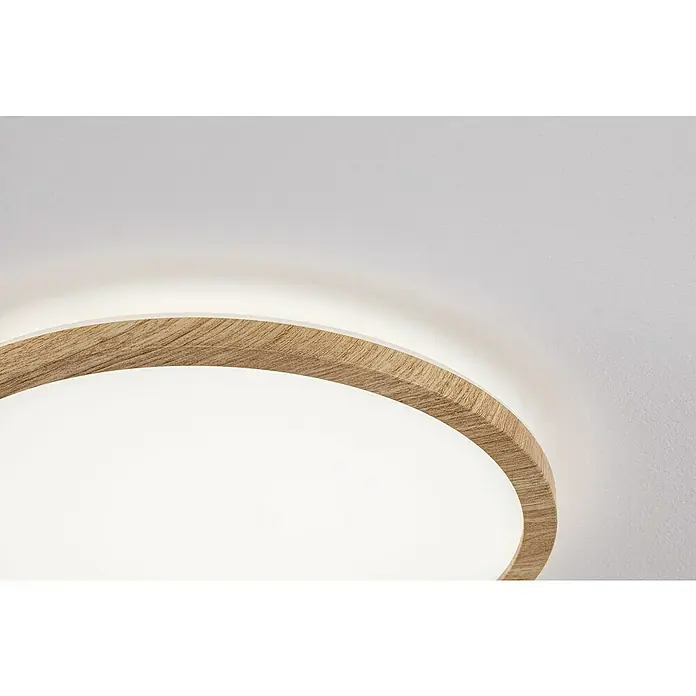 Paulmann LED-Panel rund Atria Shine IP44 - Neutralweiß, 19 W, Holz, Durchmesser: 29,3 cm - Nahaufnahme einer runden Deckenleuchte mit Holzrahmen und weißem Diffusor, die ein warmes, diffuses Licht abgibt.