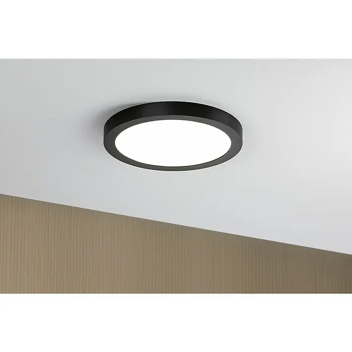 Paulmann LED-Panel rund Abia - 24 W, Schwarz, Neutralweiß - Nahaufnahme einer runden, schwarzen Deckenleuchte mit einem hellen, diffusen Licht auf einer weißen Decke.