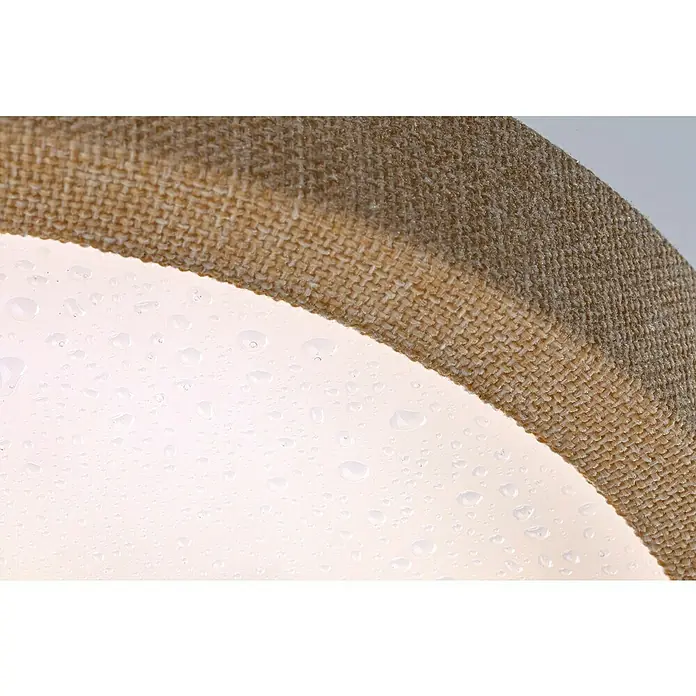 Paulmann LED-Panel rund Cosara - 15 W, Ø x H: 30 x 6,2 cm, Beige, Neutralweiß - Nahaufnahme einer runden Lampe mit Stoffschirm, die mit Wassertropfen bedeckt ist. Textur und Beleuchtung stehen im Fokus.