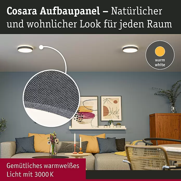 Paulmann LED-Panel rund Cosara - 15 W, Ø x H: 30 x 6,2 cm, Dungelgrau, Warmweiß - Rundes Cosara LED-Aufbaupanel mit grauem Textilrahmen, das warmweißes Licht abgibt, an einer Decke in einem Wohnzimmer.