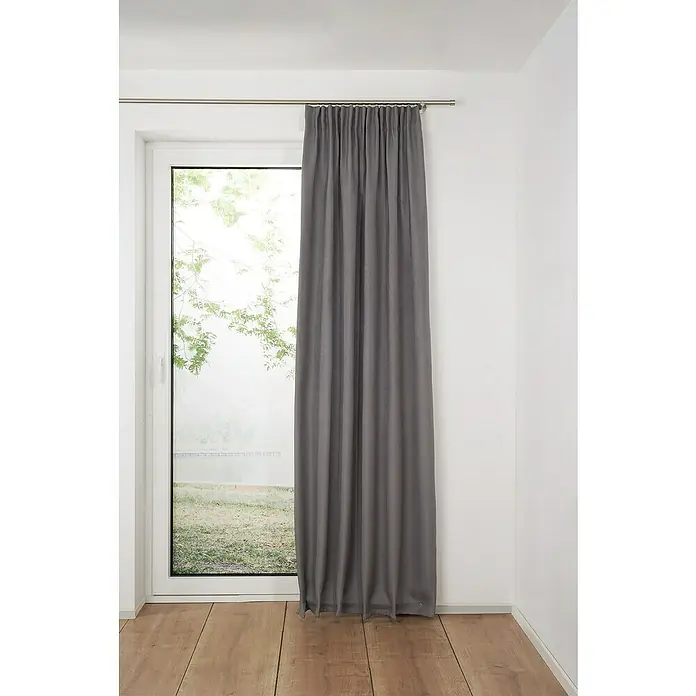 Schlaufenschal Dim - B x H: 135 x 245 cm, 100 % Polyester, Anthrazit - Grauer Vorhang neben einem Fenster, der Privatsphäre bietet und das Tageslicht sanft filtert. Ideal zur Dekoration und Verdunkelung.