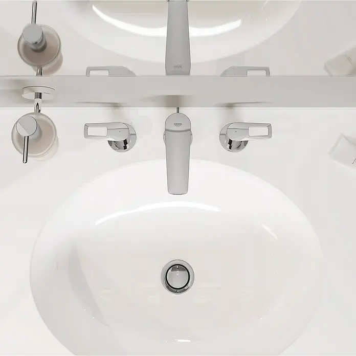 Grohe Essentials Ersatz-Seifenspender - Chrom, Glänzend - Moderne Waschtischarmatur von Grohe in einem eleganten Badezimmer, die Funktionalität und minimalistisches Design vereint.