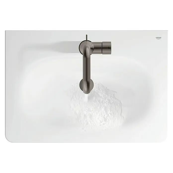 Grohe Essence New Waschtischarmatur M-Size - Mit Zugstange, Hard Graphite, Matt - Das Bild zeigt einen eleganten, modernen Waschtischarmatur von Grohe in einer stilvollen Badezimmerumgebung.
