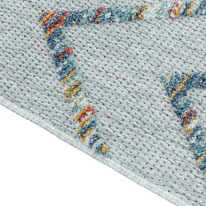 Outdoor-Teppich Bahama IV - Multi, 200 x 140 cm, 100 % Polypropylen - Detailaufnahme eines gemusterten Teppichs mit farbigen Akzenten und gewebter Textur, ideal für Wohnräume und Dekoration.