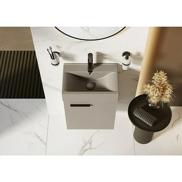 Badmöbel-Set Tiny - Gesamtbreite Badmöbel: 45 cm, Fume, Matt, DIN Anschlag: Links/Rechts, 2 -tlg. - Ansicht von oben auf ein modernes Badezimmerwaschbecken in Grau mit Armatur und Accessoires.