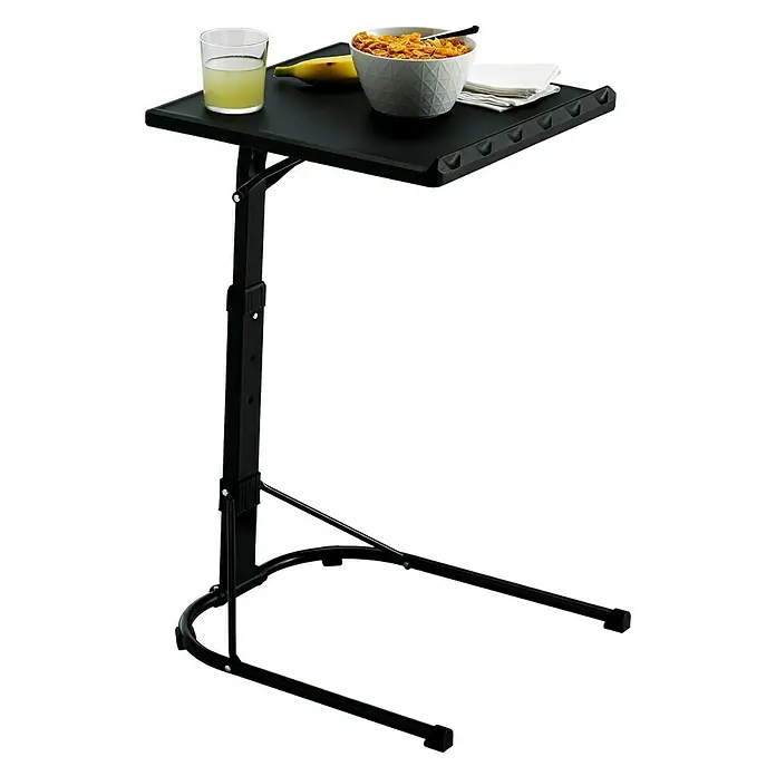 Mesa plegable Multitable - L x An x Al: 43 x 49 x 73 cm, Negro - Una mesa de cama negra regulable en altura con desayuno, que consta de una bebida, un plátano y un tazón de cereal.