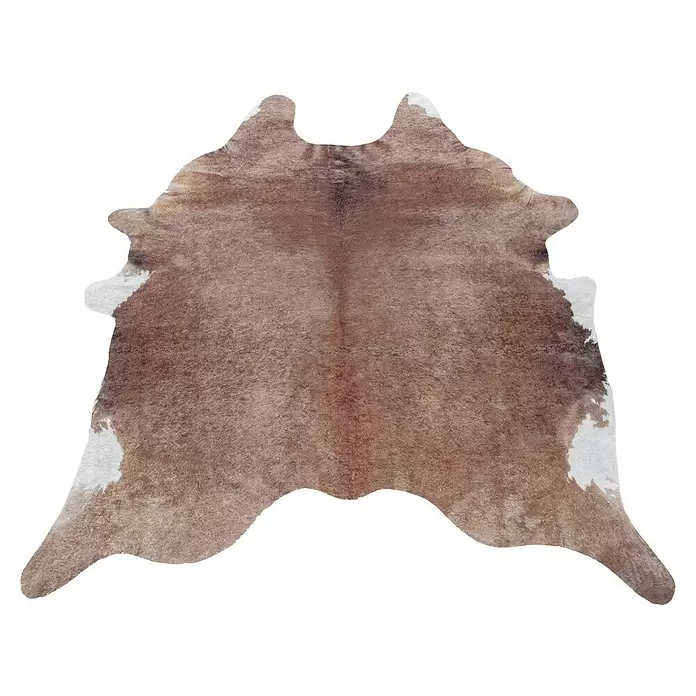 Flachgewebeteppich Etosha - Kuh, Braun, 200 x 150 cm, 100 % Polyester - Brauner und weißer Kuhfellteppich in natürlicher, unregelmäßiger Form, ideal für Wärme und Textur im Raum.