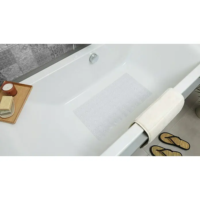 Tatay Alfombra antideslizante para ducha BCN - 36 x 72 cm, PVC, Translúcido - Una alfombra de baño antideslizante rectangular transparente dentro de un baño blanco. La alfombra de baño garantiza una mayor seguridad al bañarse.