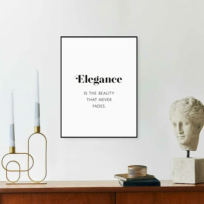 Reinders Bild Slim Frame Black - B x H: 30 x 40 cm, Elegance - Ein elegantes Wandbild mit der Aufschrift "Elegance is the beauty that never fades" ziert eine Kommode mit Kerzenständer und einer Büste.