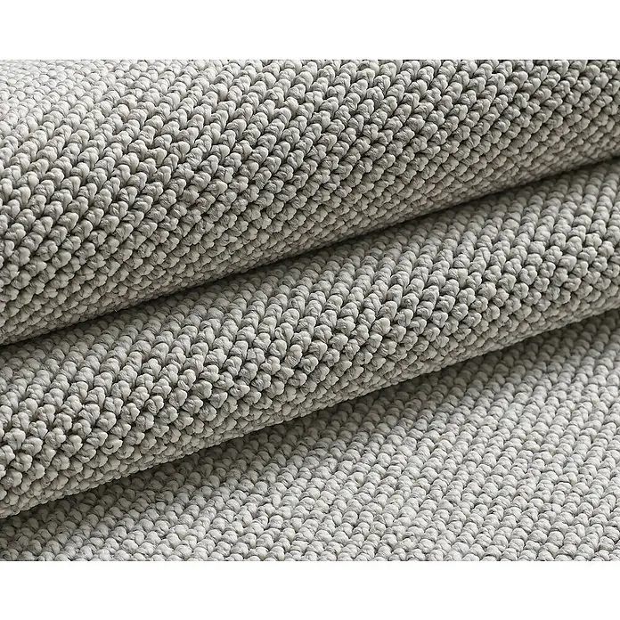 Flachgewebeteppich Loom - Silber, Durchmesser: 160 cm, 100 % Polypropylen - Detailaufnahme eines gewickelten, grauen Teppichs, der eine weiche und strukturierte Oberfläche zeigt. Ideal für Komfort und Stil im Wohnbereich.