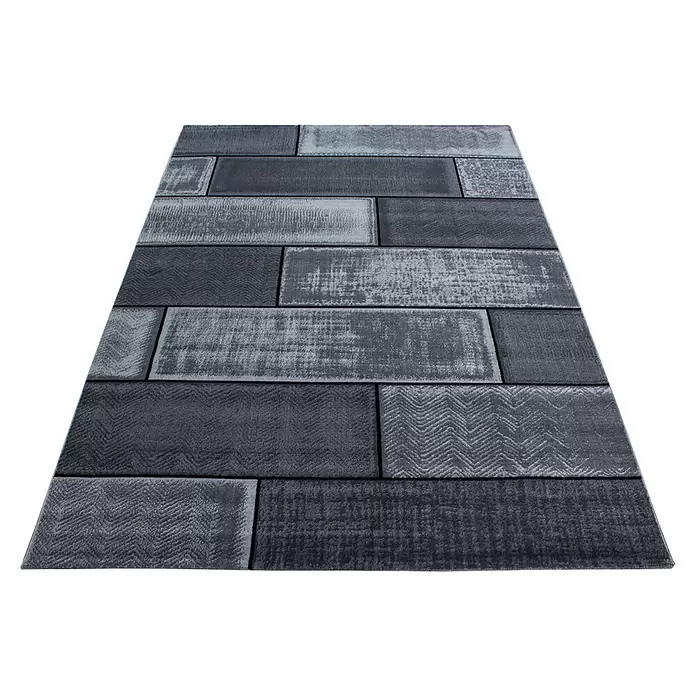 Kurzflorteppich Plus - Anthrazit, 370 x 280 cm, 100 % Polypropylen - Rechteckiger Teppich mit Mosaikmuster aus grauen und schwarzen Blöcken, teils distressed, teils mit Chevron-Textur.