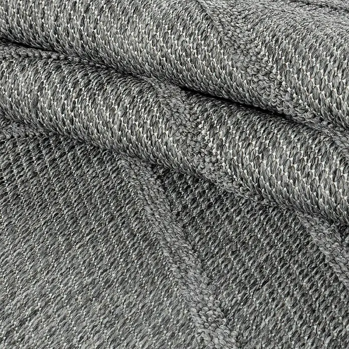 Outdoor-Teppich Patara I - Grau, 170 x 120 cm, 100 % Polypropylen - Nahaufnahme eines grauen, gestrickten Stoffes mit feiner Textur, der sich in weichen Falten legt und eine dezente Eleganz ausstrahlt.