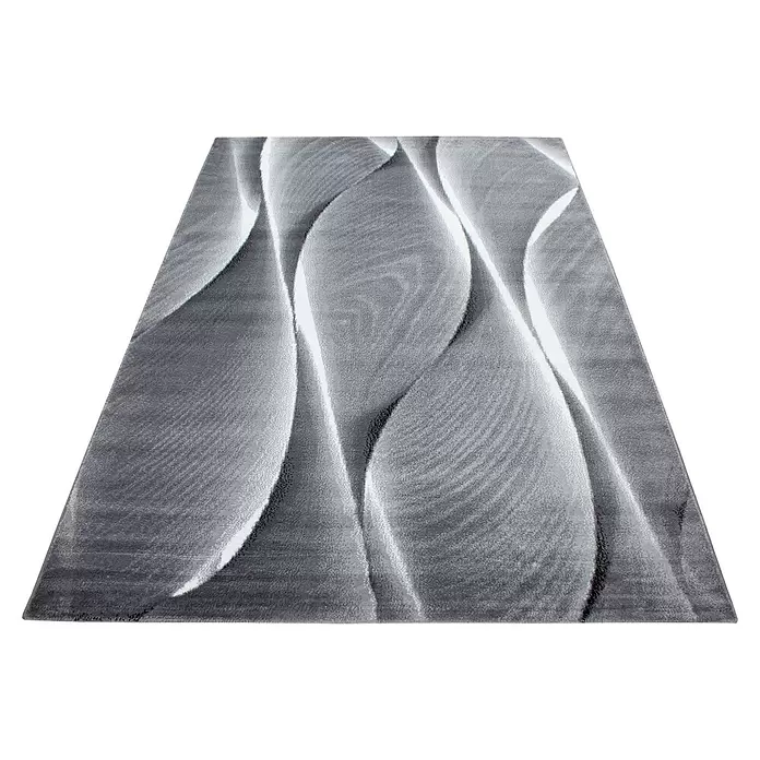 Kurzflorteppich Parma 9310 - Schwarz, 200 x 140 cm, 100 % Polypropylen - Texturierter grauer Teppich mit abstrakten Wellenmustern in Weiß und Hellgrau.