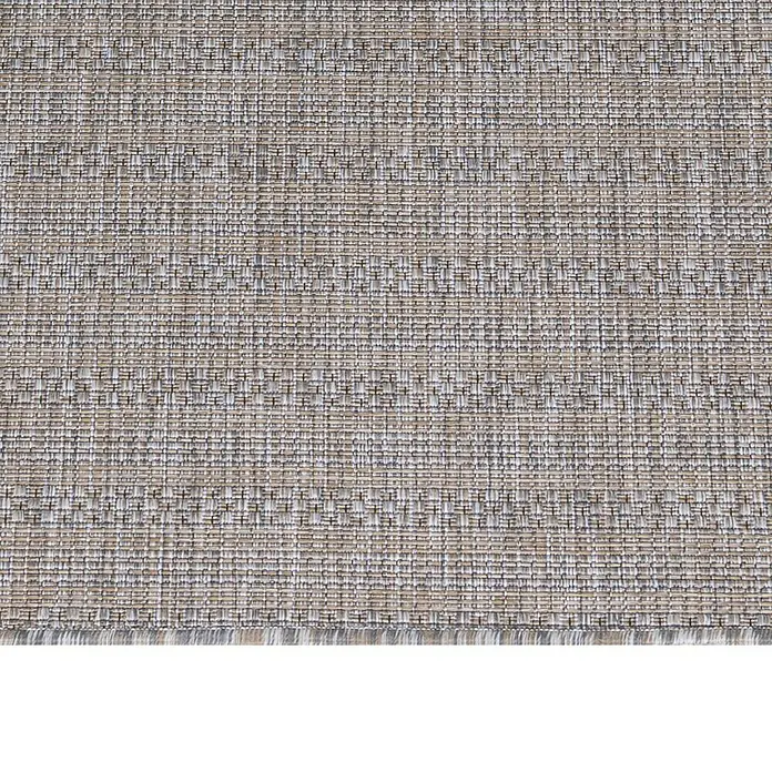 Outdoor-Teppich Zagora III - Beige, 170 x 120 cm, 100 % Polypropylen - Detailansicht eines beigefarbenen Teppichs mit feiner Webstruktur, ideal für Wohnbereiche. Robuste Textur und dezente Farbgebung.