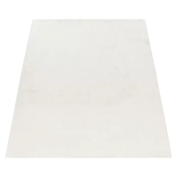 Hochflorteppich Pouffy - Creme, 200 x 140 cm, 100 % Polyester - Schlichte, weiße, rechteckige Textilmatte, perspektivisch dargestellt.