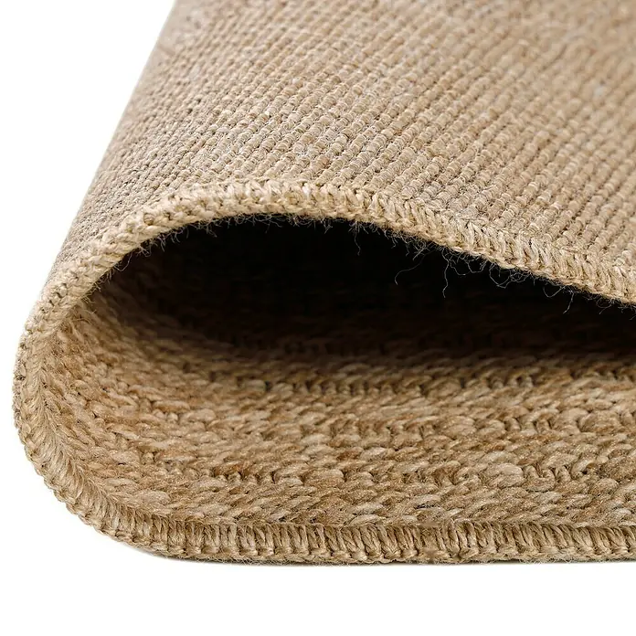 Outdoor-Teppich Comilla I - Schwarz, Durchmesser: 80 cm, 100 % Polypropylen - Detailaufnahme eines Teppichs aus Naturfasern, der die Textur und Verarbeitung des Materials hervorhebt. Ideal für ein gemütliches Zuhause.