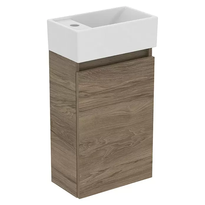 Ideal Standard Eurovit Badmöbel-Set + - 37 cm, Nussbaum, Hahnloch: Links - Kompakter Waschtischunterschrank mit weißem Keramikwaschbecken auf graubrauner Holzoptik.