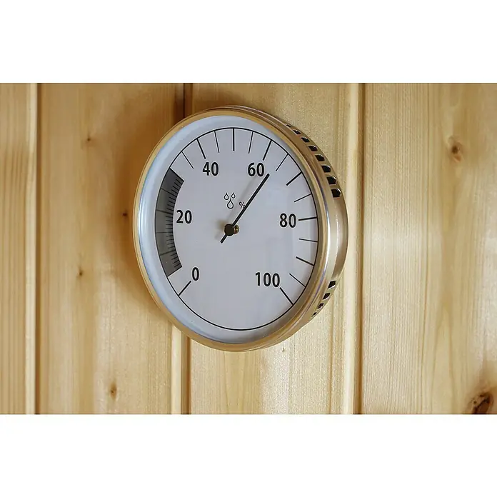 Karibu Hygrometer Classic - Metall, Messbereich Hygrometer: 0 - 100 % r.F. - Nahaufnahme eines Hygrometers an einer Holzwand. Das Hygrometer zeigt eine Luftfeuchtigkeit von etwa 60 % an.