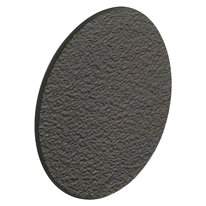 Suki Tapón embellecedor - Diámetro: 18 mm, Negro - Primer plano de un producto gris redondo con textura, ideal para diversas aplicaciones y que ofrece un aspecto único.