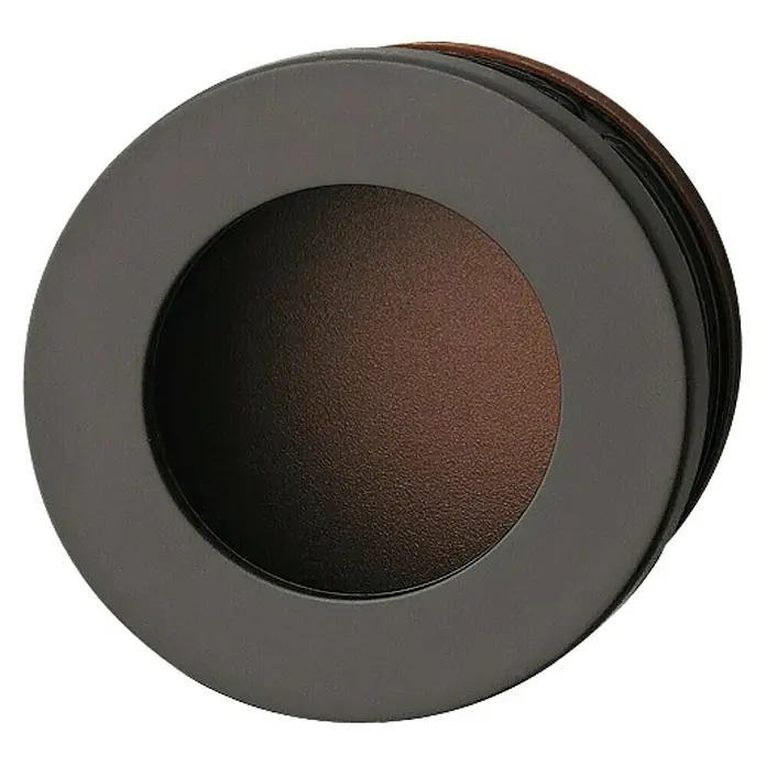 Häfele Tirador para muebles - Tipo de tirador del mueble: Concha, Plástico, Ø x L: 54 x 10 mm - Primer plano de un tirador empotrado redondo y oscuro para puertas correderas, ideal para interiores modernos y diseños que ahorran espacio.