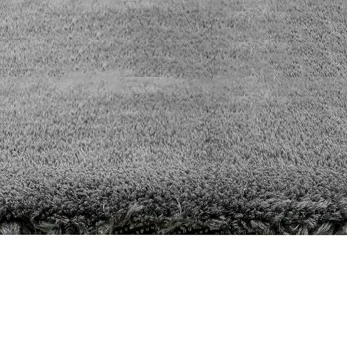 Alfombra de pelo corto Toscana - Gris, 300 x 200 cm, 100% Poliéster - Primer plano de una alfombra gris que muestra su textura suave y acogedora, ideal para añadir calidez y confort a los espacios.