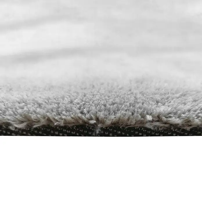Alfombra de pelo corto Toscana - Plateado, 300 x 200 cm, 100% Poliéster - Primer plano de una alfombra gris y esponjosa, que promete suavidad y comodidad para cualquier habitación.\n