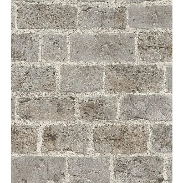 Rasch Symphony Vliestapete Backstein - Steingrau, Steinoptik, 10,05 x 0,53 m - Nahaufnahme einer Wand aus grauen Ziegelsteinen mit hellem Mörtel, die eine rustikale Textur und ein klassisches Mauerwerksmuster zeigt.