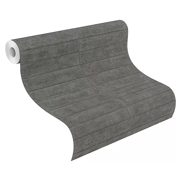 Rasch Factory V Vliestapete Beton - Anthrazit, Steinoptik, 10,05 x 0,53 m - Graue Tapetenrolle mit Holzoptik, abrollend.