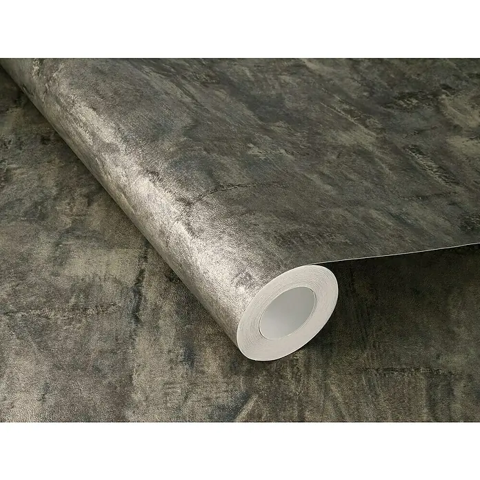 Rasch Factory V Vliestapete Uni-Struktur - Anthrazit, Wellen, 10,05 x 0,53 m - Nahaufnahme einer Rolle grauer, strukturierter Vinyltapete, die eine subtile, moderne Ästhetik für jeden Raum bietet.