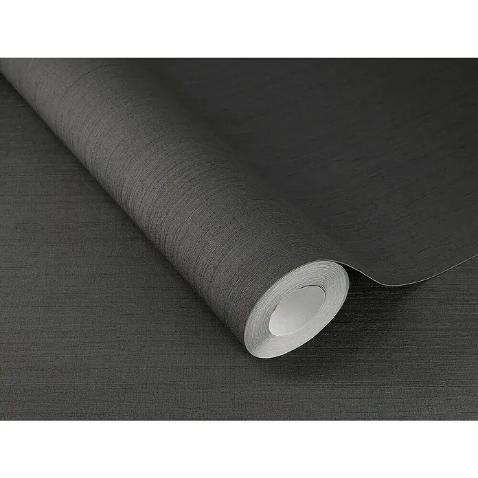 Rasch Wall Textures VI Vliestapete Struktur-Uni - Anthrazit, Uni, 10,05 x 0,53 m - Nahaufnahme einer Rolle dunkler Vliestapete mit feiner Textur, ideal für moderne Innenräume und zur Wandgestaltung.