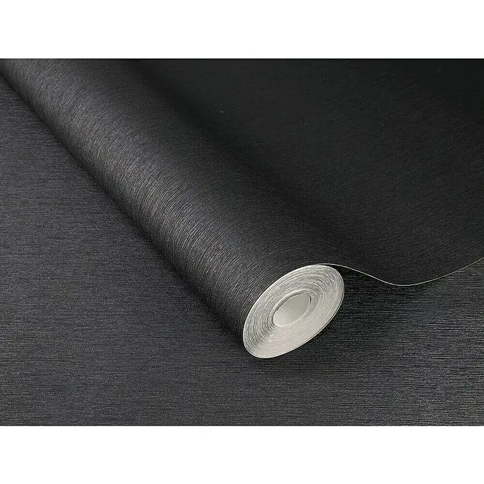 Rasch Sky Lounge Vliestapete Metallic-Uni - Dunkelblaugrau, Uni, 10,05 x 0,53 m - Nahaufnahme einer Rolle schwarzer Tapete mit feiner Textur, die für stilvolle Wandgestaltungen im Innenbereich geeignet ist.