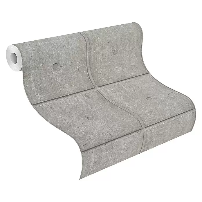 Rasch Factory V Vliestapete Zementfliese - Concrete, Steinoptik, 10,05 x 0,53 m - Graue Tapete in Betonoptik, von einer Rolle abgerollt, mit Paneellinien und runden Vertiefungen.