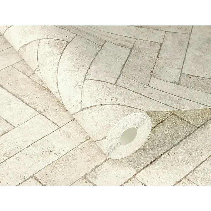 Rasch Factory V Vliestapete Bricks - Kalkstein, Steinoptik, 10,05 x 0,53 m - Nahaufnahme einer Rolle weißer Backsteinmuster-Tapete, die ein rustikales und modernes Dekorationsmaterial zeigt.\n