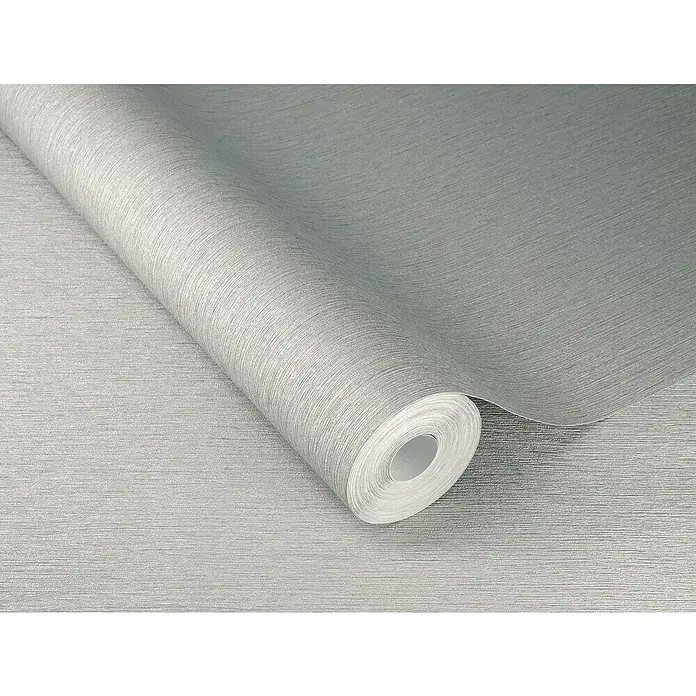 Rasch Sky Lounge Vliestapete Metallic-Uni - Silbergrau, Uni, 10,05 x 0,53 m - Nahaufnahme einer Rolle strukturierter, silberfarbener Tapete, die sich perfekt für die Dekoration und Renovierung eignet.