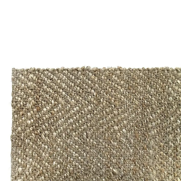Alfombra de yute Alcázar - Natural, 290 x 200 cm, 100% yute - Detalle de una alfombra de fibra natural tejida, destacando la textura, ideal para la decoración orgánica del hogar.