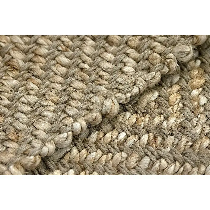 Alfombra de yute Alcázar - Natural, 290 x 200 cm, 100% yute - Primer plano de una alfombra de yute trenzado. El material natural y la textura tejida le dan a la alfombra un atractivo rústico.