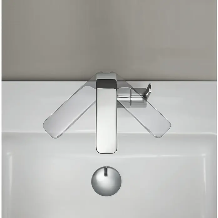 Grohe Lineare Waschtischarmatur L-Size - Chrom, Glänzend - Modern aussehende Chrom-Armatur auf einem weißen Waschbecken. Die Armatur verfügt über einen ungewöhnlichen Klappmechanismus.