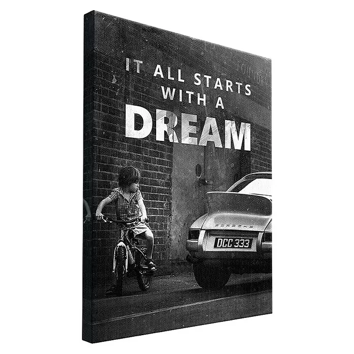 Dotcomcanvas Leinwandbild - It All Starts With A Dream, B x H: 75 x 100 cm - Schwarz-weißer Leinwanddruck mit einem Kind auf dem Fahrrad, einem Porsche und dem Text "IT ALL STARTS WITH A DREAM".