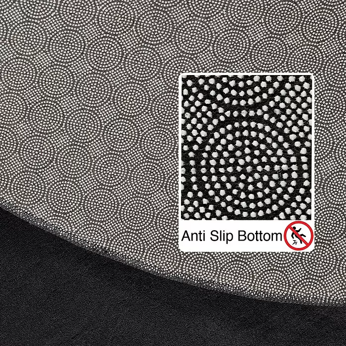 Kurzflorteppich Sky - Schwarz, Durchmesser: 160 cm, 100 % Polyester - Unterseite eines dunklen Teppichs mit genoppter Anti-Rutsch-Beschichtung.