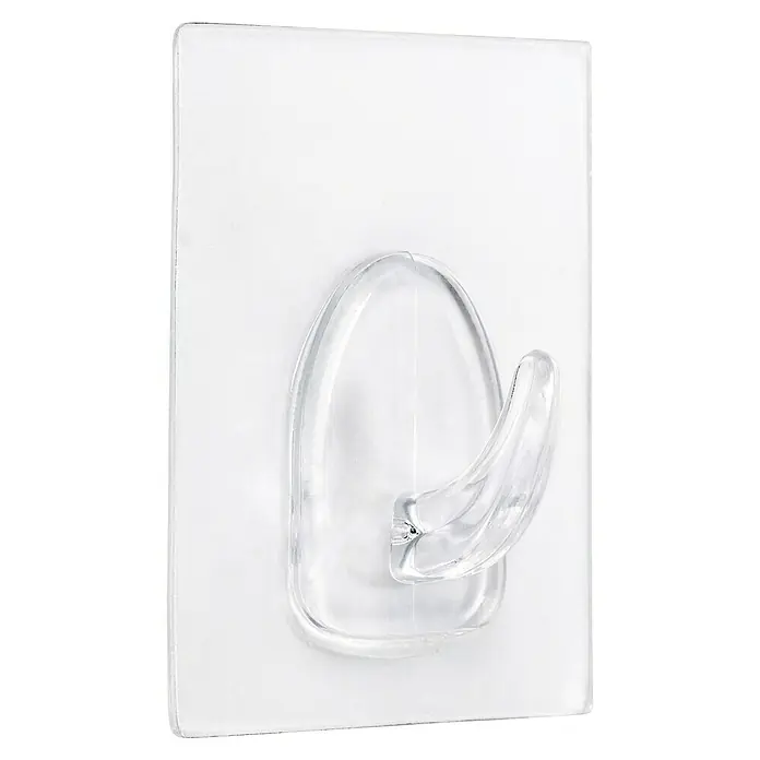 Inofix Colgador adhesivo 1290 - Plástico, Transparente, Capacidad de carga: 3 kg - Primer plano de un gancho adhesivo transparente con un respaldo rectangular blanco. Ideal para un montaje fácil en la pared sin taladrar.