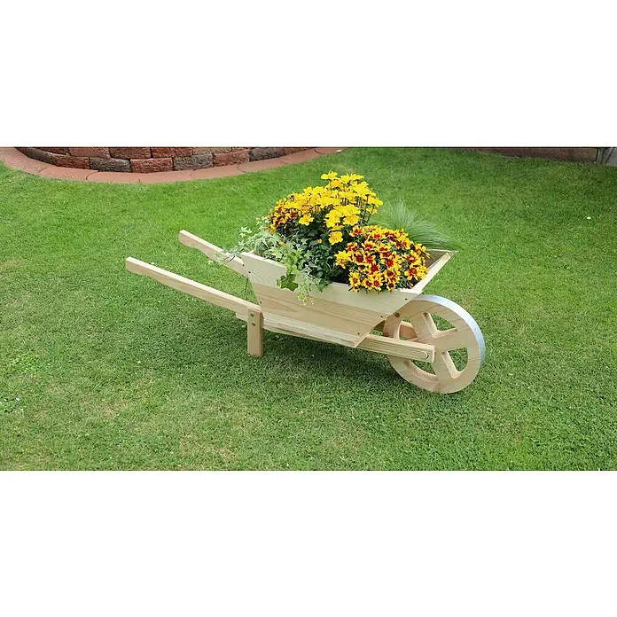 Promadino Pflanzkasten Pflanzkarre Spreewald - Außenmaß (L x B x H): 113 x 32 x 40 cm, Holz, Natur - Eine hölzerne Schubkarre mit bunten Blumen dient als dekoratives Element im Garten.