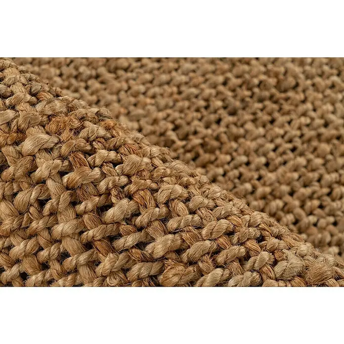 Juteteppich Nature 502 - Naturbraun, 150 x 80 cm, 100 % Jute - Nahaufnahme eines gewebten Teppichs aus Naturfasern, der die Textur und das Muster des Teppichs hervorhebt.