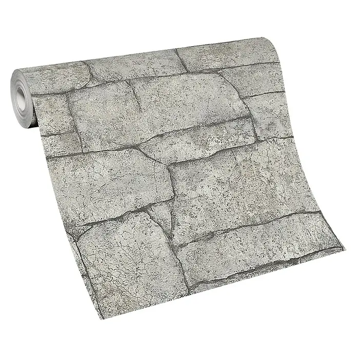 Papel pintado Muro de piedra - Blanco, 10 x 0,53 m - Primer plano de un rollo de papel pintado de vinilo con patrón de piedra, imitando un diseño de pared robusto y realista. Ideal para toques rústicos.