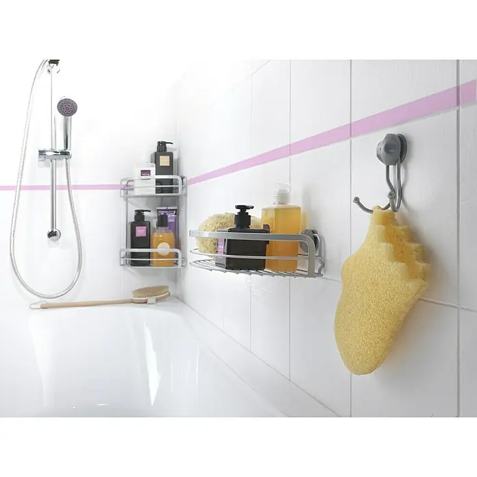 Metaltex Haken Safe Fix Viva - Kunststoff, Anzahl Paare: 1 Stk. - Badezimmer-Ecke mit einem verchromten Duschsystem und Regalen mit verschiedenen Badprodukten.
