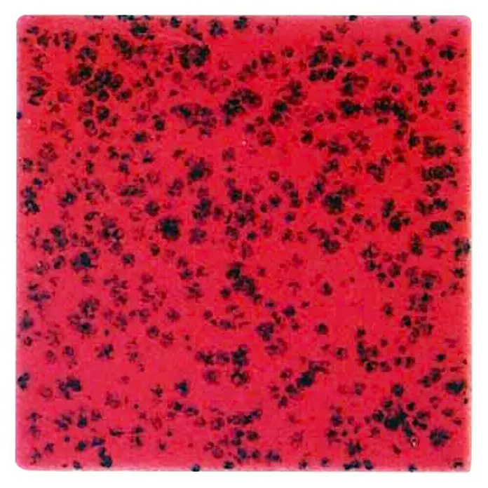 Esmalte de color Botz - Rojo punteado, 200 ml - Primer plano de una baldosa de cerámica roja con manchas negras, ideal para un diseño de cocina atrevido.